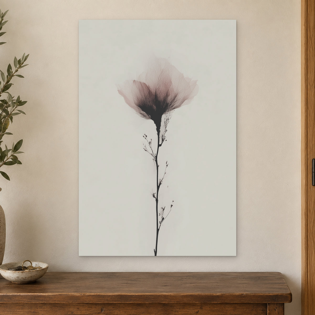 Single Stem Pink Bloom canvas wall art on a cream wall above a wooden sideboard beside a door frame
