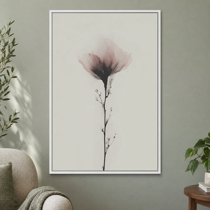 Single Stem Pink Bloom framed canvas in a white floating frame on a sage green wall beside a cream armchair
