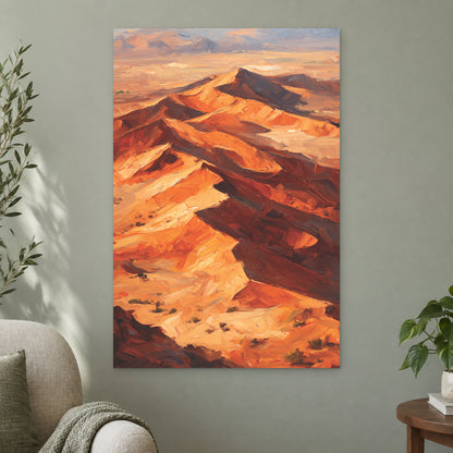 Desert Dunes Aerial Ridge canvas wall art on a sage green wall beside a cream armchair