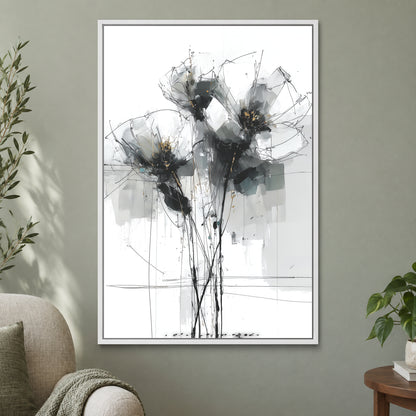 Black and Grey Wildflower Sketch framed canvas in a white floating frame on a sage green wall beside a cream armchair