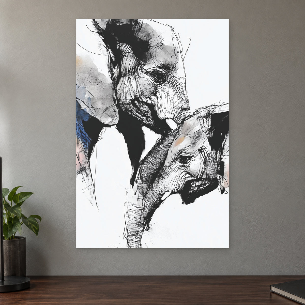 Elephant and Calf Nose to Nose canvas wall art on a taupe wall above a dark walnut sideboard with a potted plant
