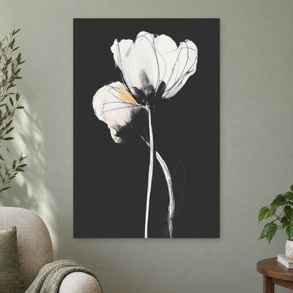 White Tulips on Black canvas wall art on a sage green wall beside a cream armchair