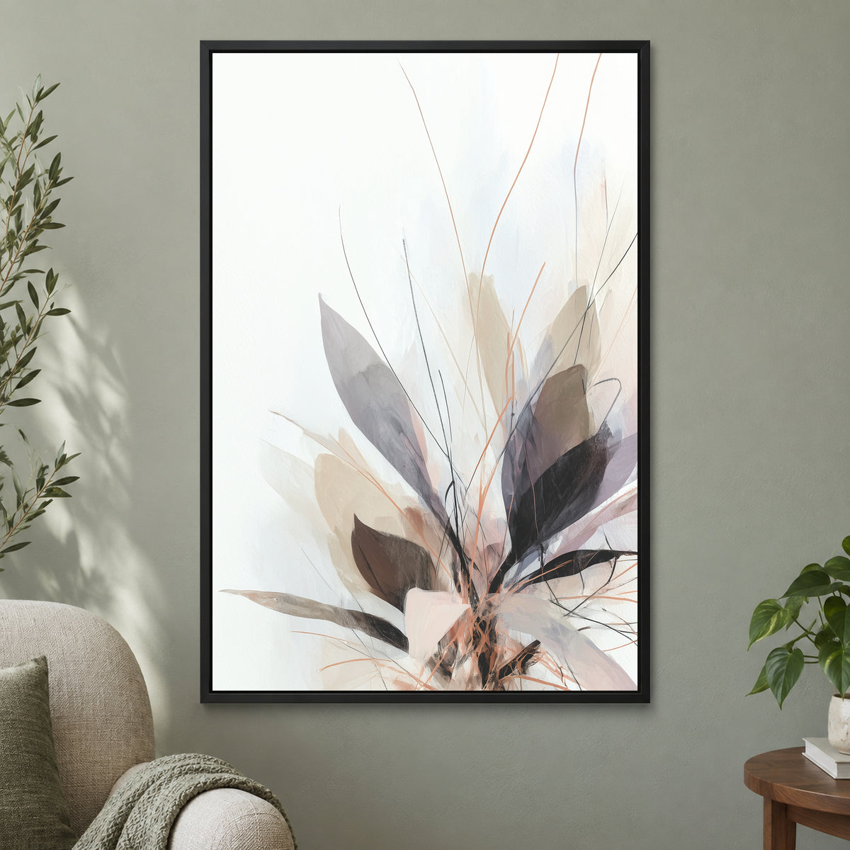 Soft Botanical Sweep Neutral framed canvas in a black floating frame on a sage green wall beside a cream armchair