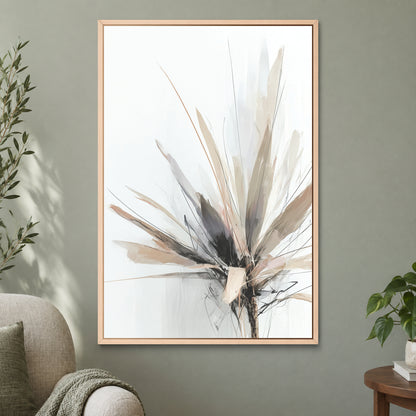Botanical Sunburst framed canvas in a natural wood floating frame on a sage green wall beside a cream armchair