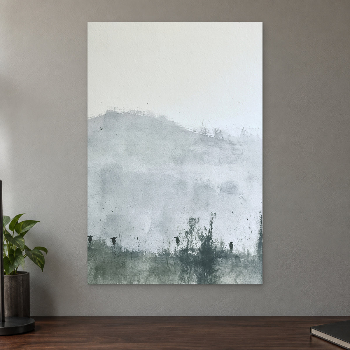 Posts Along the Hedgerow canvas wall art on a taupe wall above a dark walnut sideboard with a potted plant