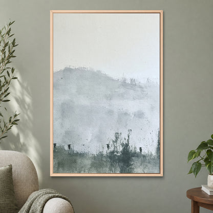 Posts Along the Hedgerow framed canvas in a natural wood floating frame on a sage green wall beside a cream armchair