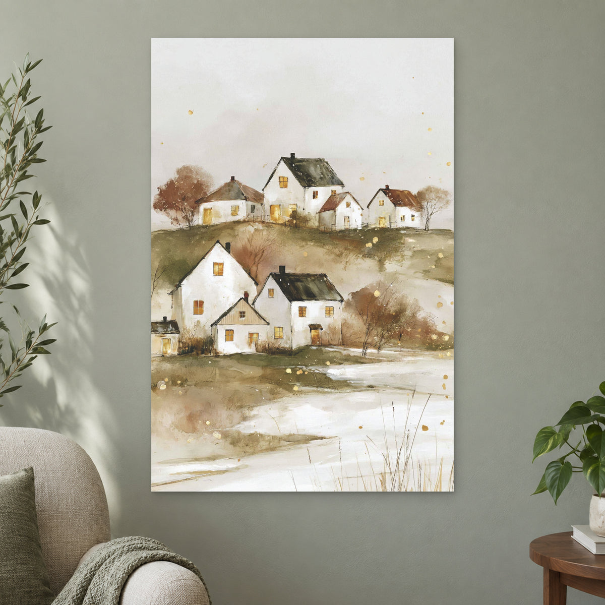 Canadian Prairie Farmhouses Winter canvas wall art on a sage green wall beside a cream armchair