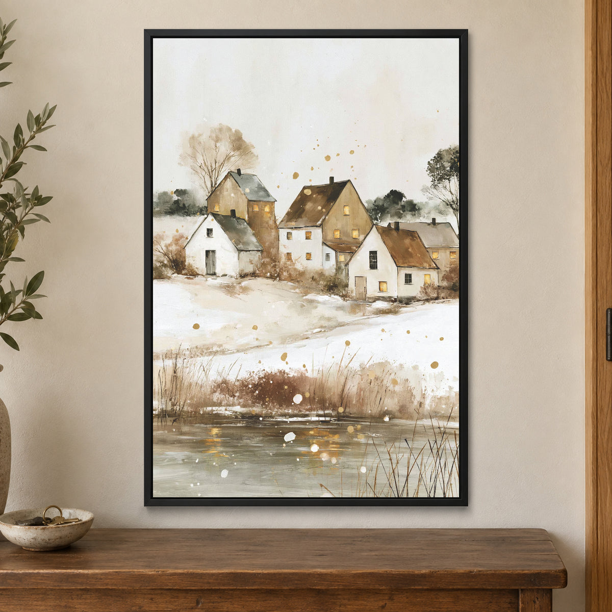 Prairie Farmhouse Frozen Lake framed canvas in a black floating frame on a cream wall above a wooden sideboard beside a door frame
