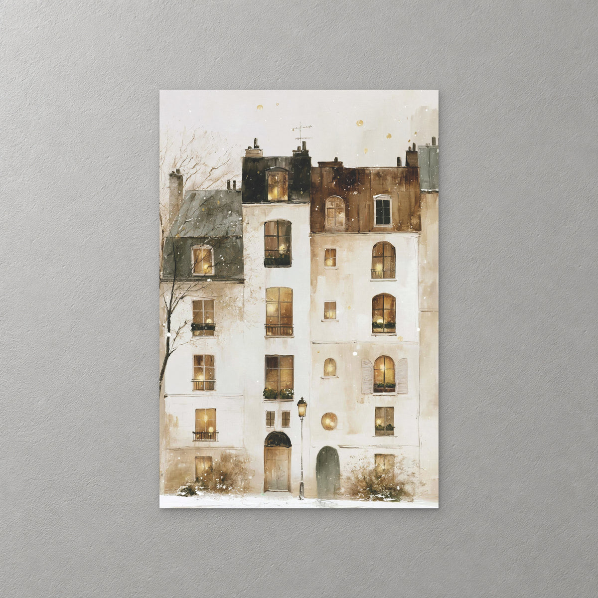 Snow falls over a tall white Paris building with rows of warm lit windows, dark rooftops and a single street lamp at its door — canvas wall art print