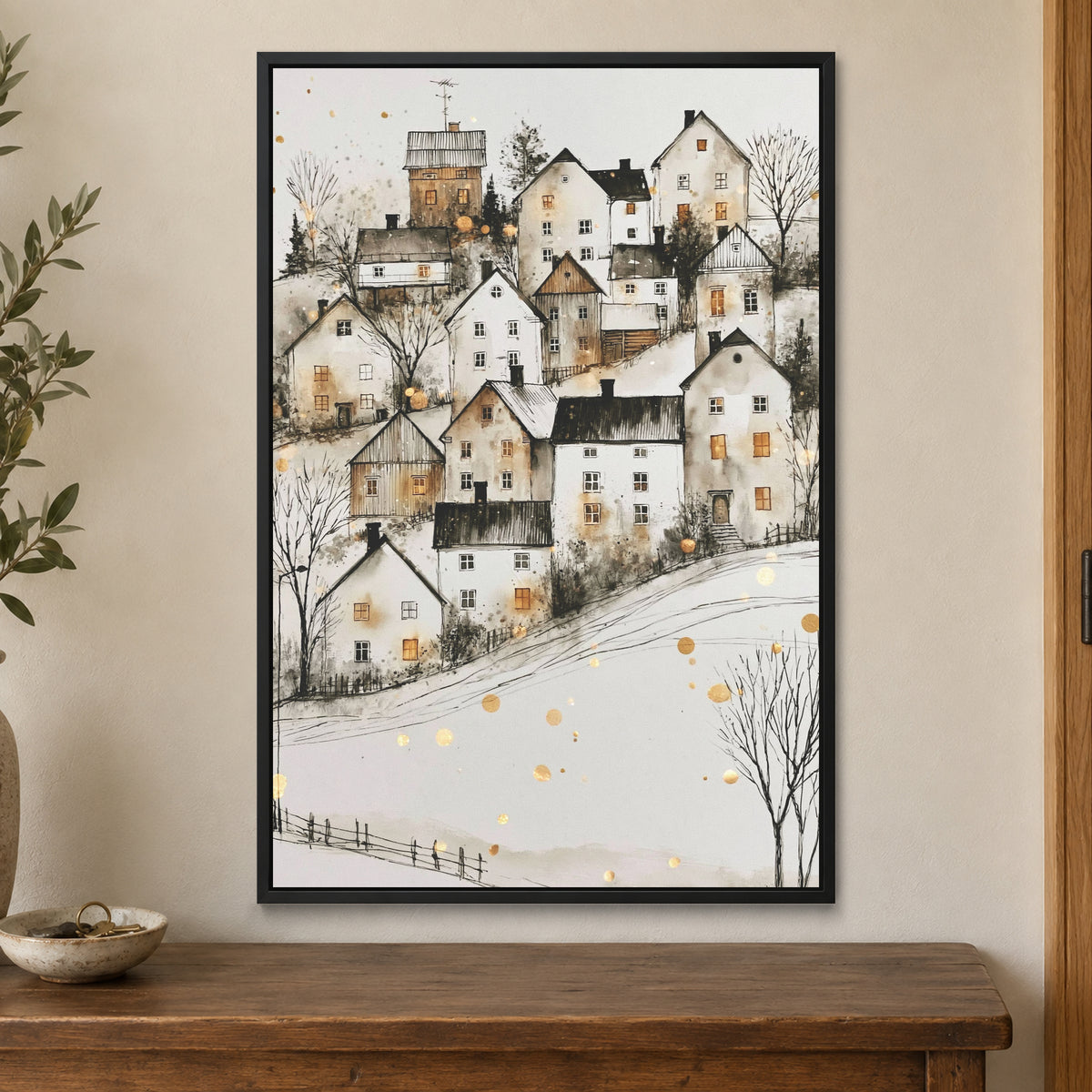 Scandinavian Hillside Gold Fleck framed canvas in a black floating frame on a cream wall above a wooden sideboard beside a door frame