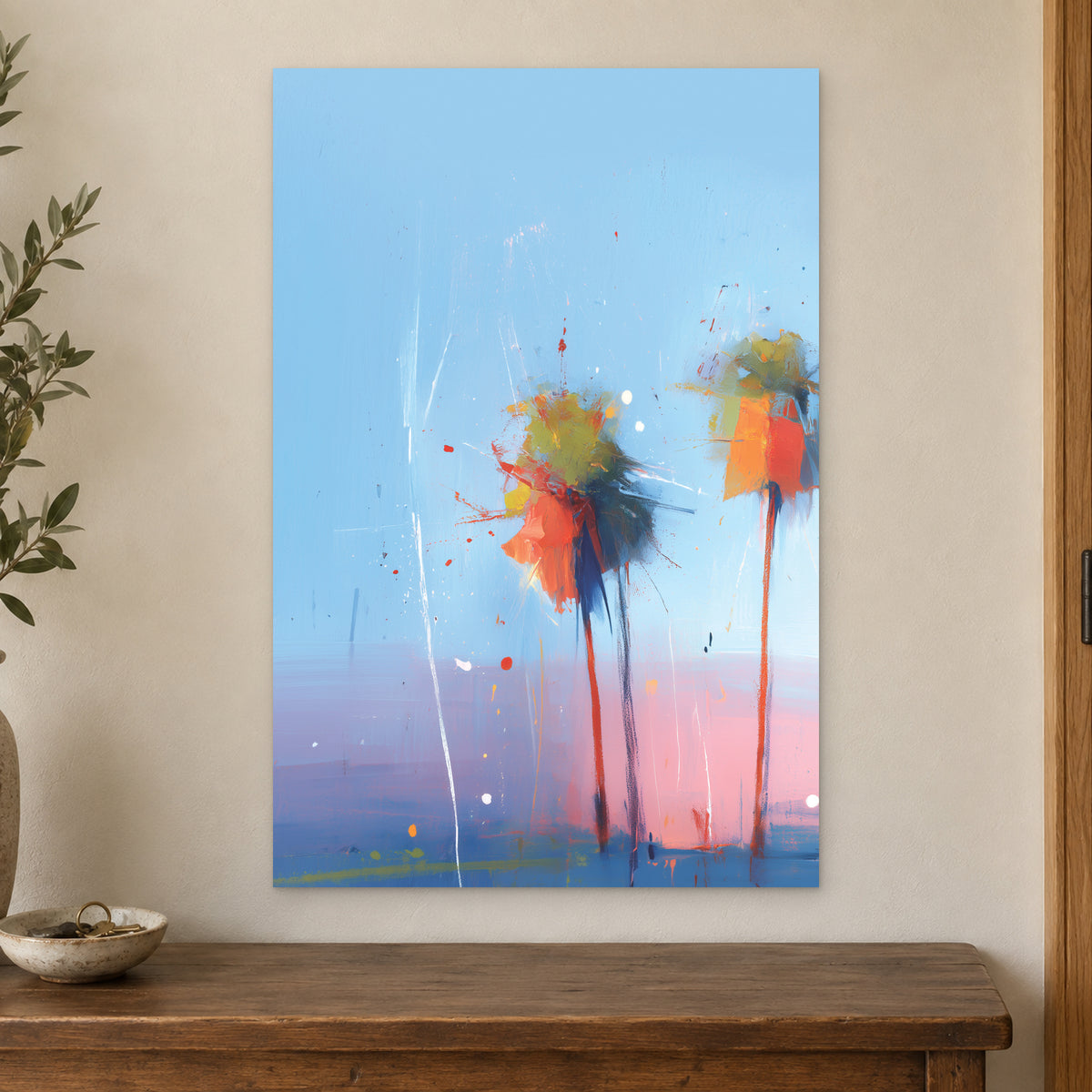 Palms Coming Apart canvas wall art on a cream wall above a wooden sideboard beside a door frame