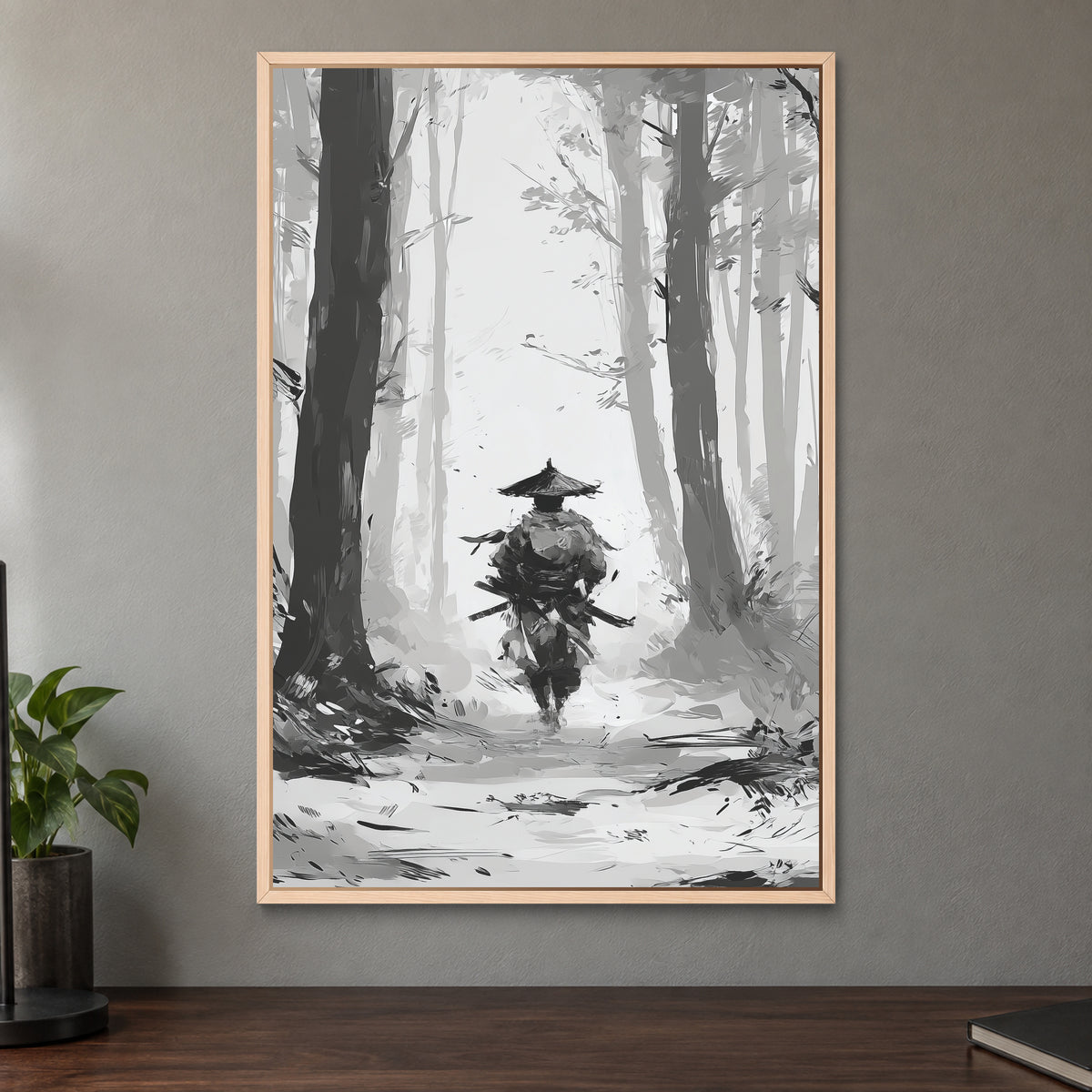 Samurai in the Snowy Woods framed canvas in a natural wood floating frame on a taupe wall above a dark walnut sideboard with a potted plant