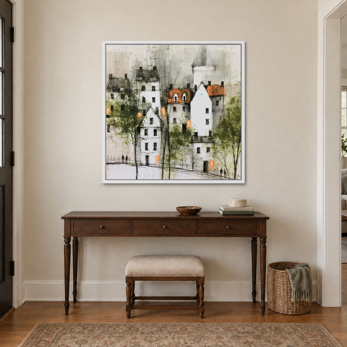 White Gables and Bare Trees framed canvas in a white floating frame above a dark wood console table and upholstered bench