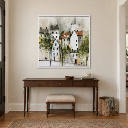 White Gables and Bare Trees framed canvas in a white floating frame above a dark wood console table and upholstered bench