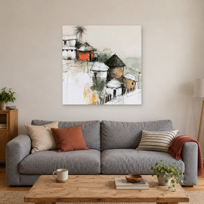 One Red Hut on the Slope canvas wall art above a grey sofa with rust and striped cushions