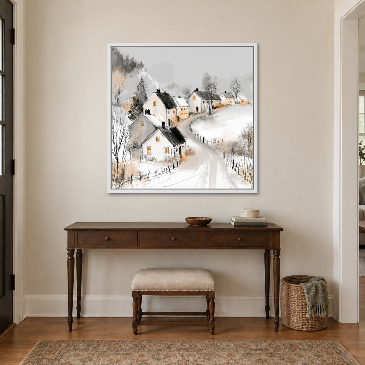 The Lane Home in Winter framed canvas in a white floating frame above a dark wood console table and upholstered bench