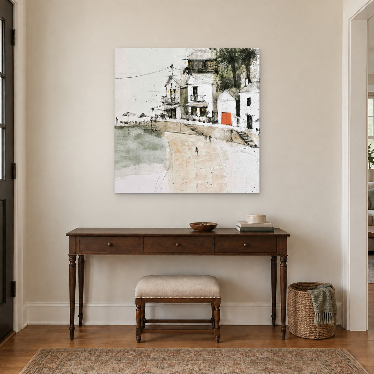 The Orange Door canvas wall art above a dark wood console table and upholstered bench in an entryway