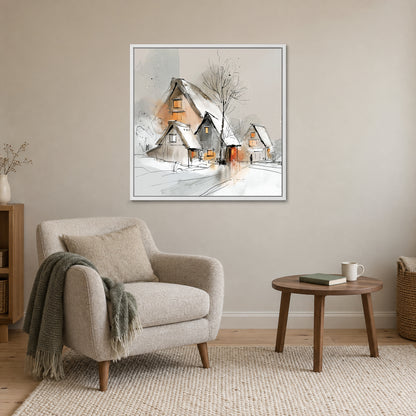 Three Thatched Roofs and a Tree framed canvas in a white floating frame above a cream armchair and round wooden side table