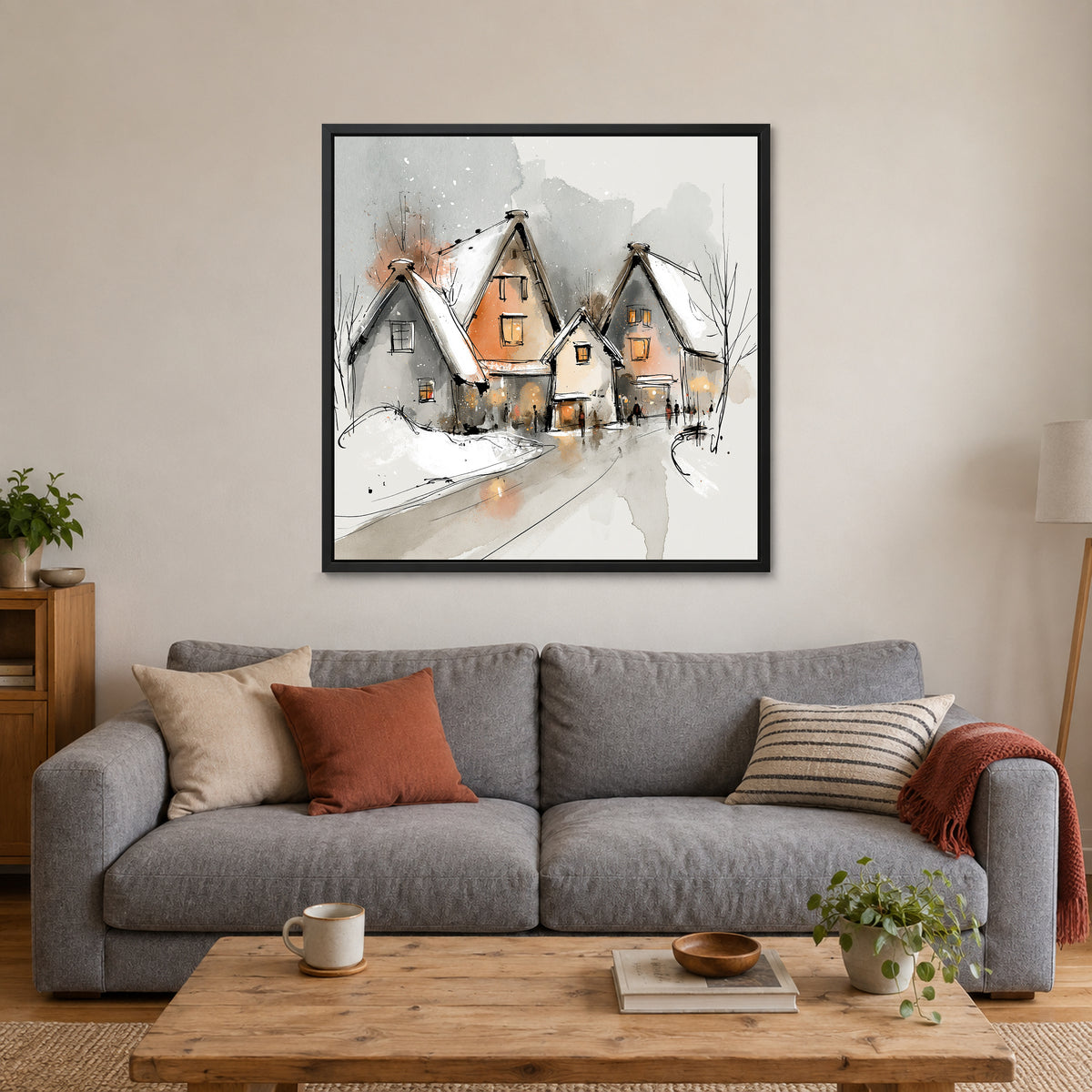 Lit Windows in the Snowfall framed canvas in a black floating frame above a grey sofa with rust and striped cushions
