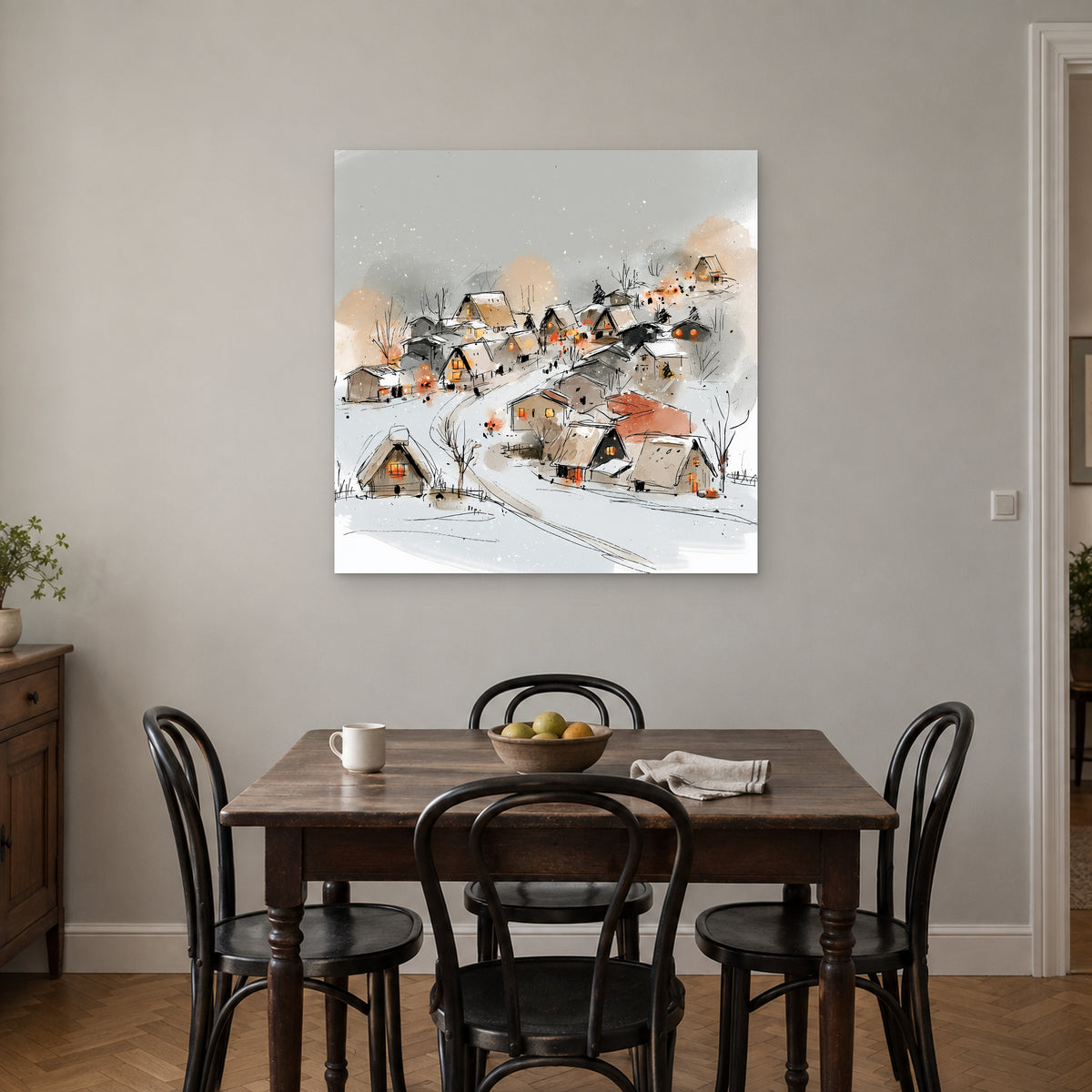 Snowy Hillside Village Ink Sketch canvas wall art above a small wooden dining table with black bentwood chairs