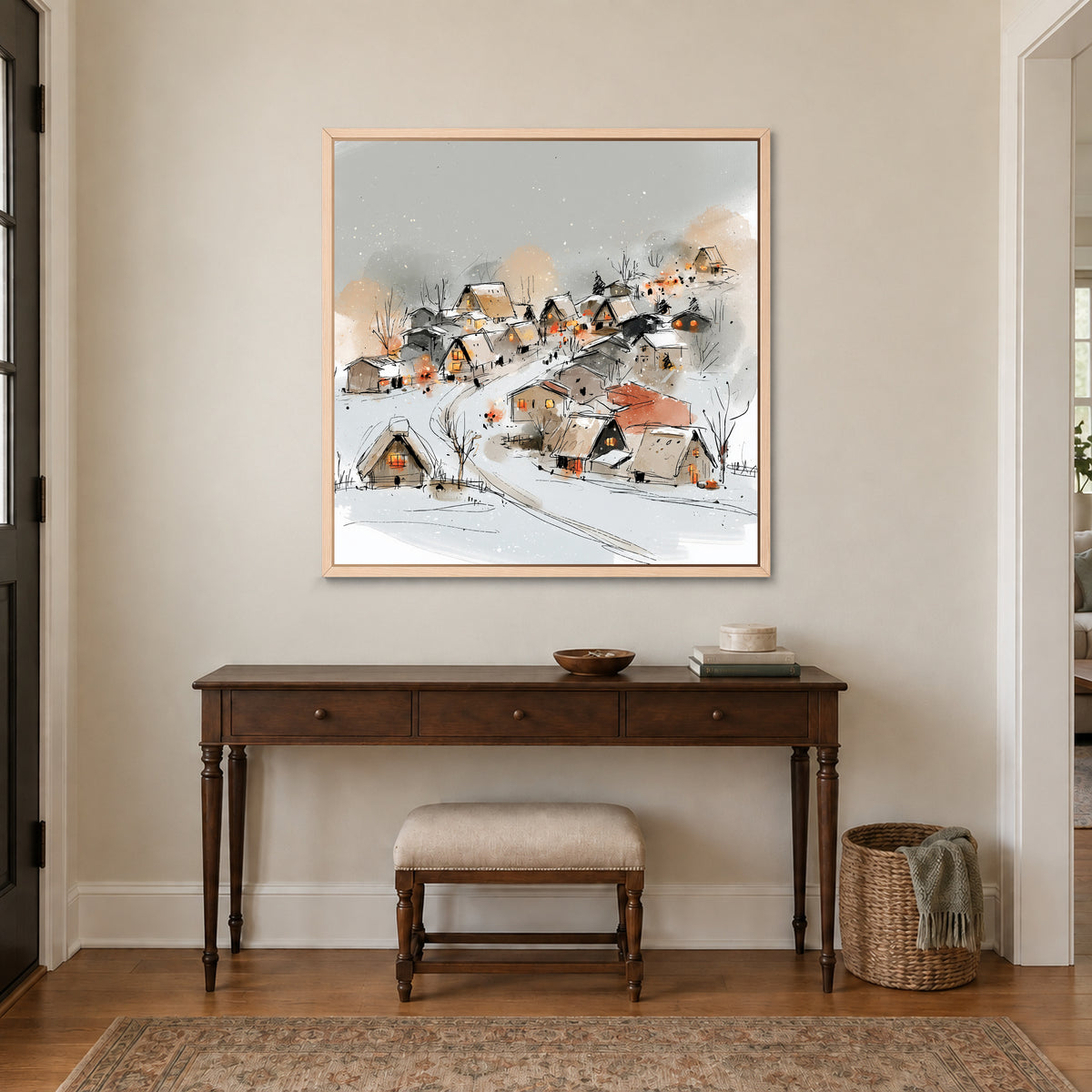 Snowy Hillside Village Ink Sketch framed canvas in a natural wood floating frame above a dark wood console table and upholstered bench