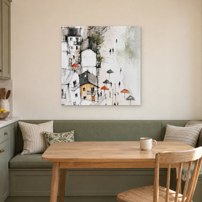 Sicilian Hill Town Pen and Wash canvas wall art above a green banquette and wooden table in a breakfast nook
