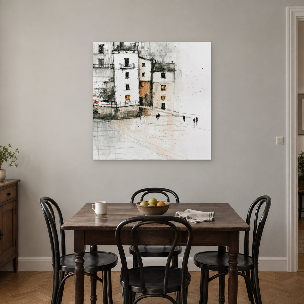 Sicilian Quay in Pencil and Ink canvas wall art above a small wooden dining table with black bentwood chairs