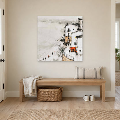 Sicilian Cliff Town Above the Sand canvas wall art above a wooden entryway bench with a woven basket