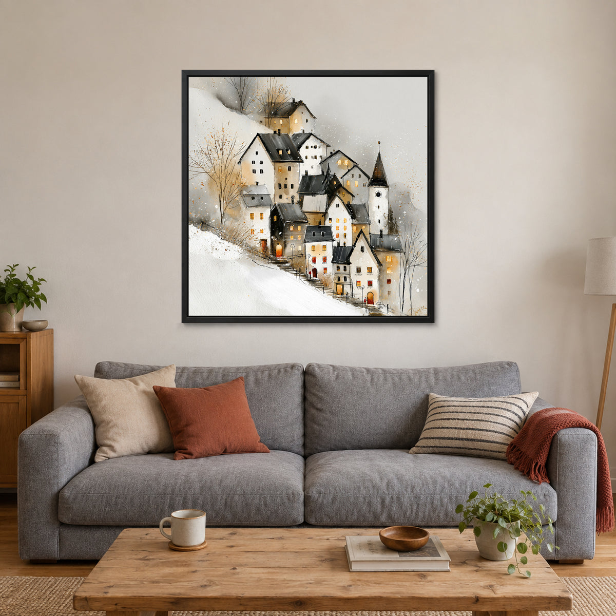 Zermatt Clock Tower in Snowfall framed canvas in a black floating frame above a grey sofa with rust and striped cushions