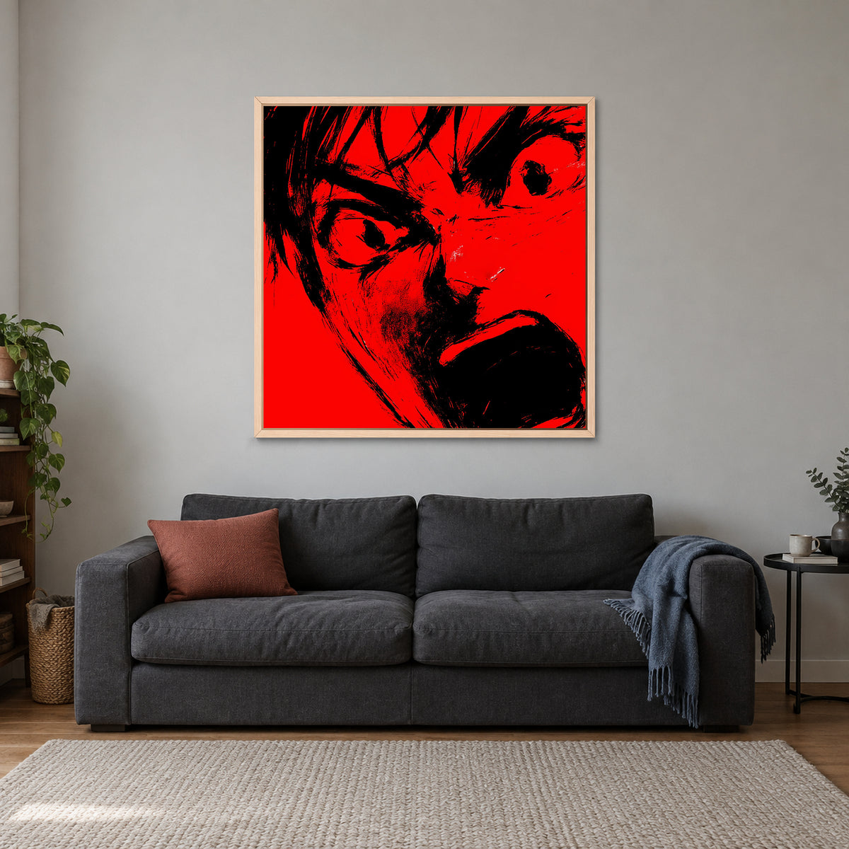 Anime Rage in Black and Red framed canvas in a natural wood floating frame above a charcoal sofa with a rust cushion