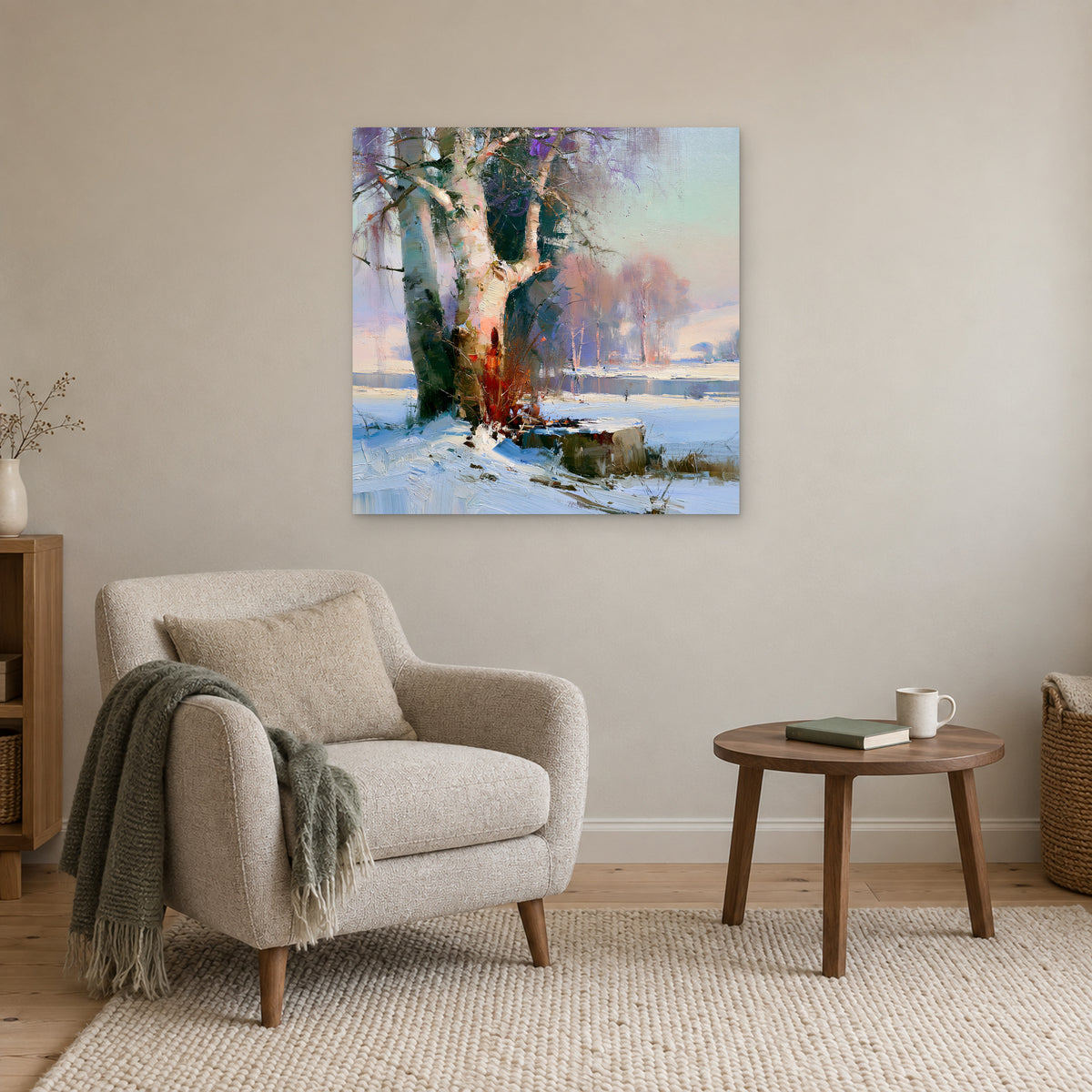 Birches on the Frozen River canvas wall art above a cream armchair and round wooden side table