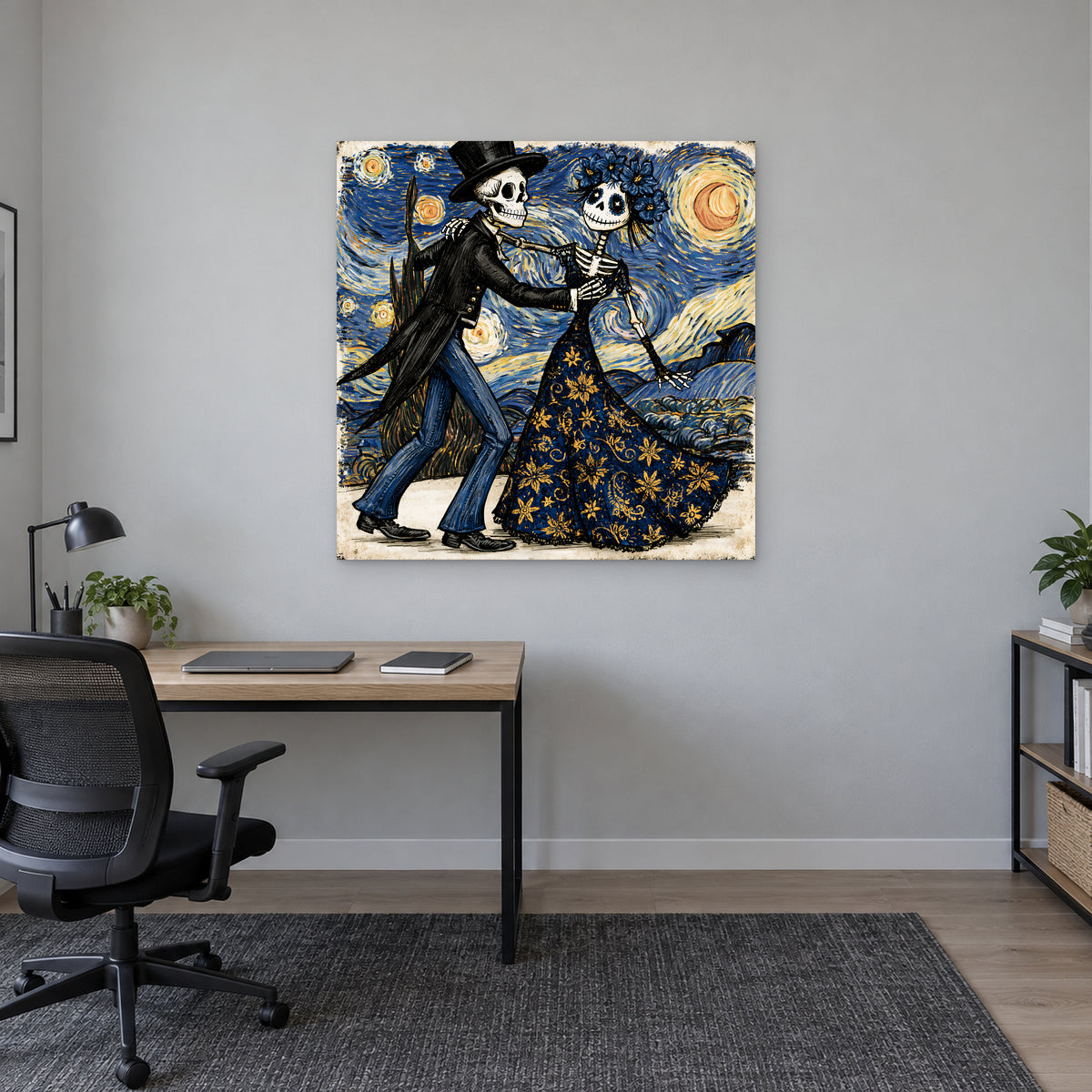 Skeletons Dancing Under Stars canvas wall art above a light wood desk with a black office chair in a home office