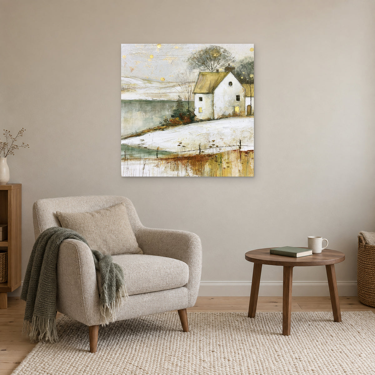 Gold Flecks Over a Frozen Lake canvas wall art above a cream armchair and round wooden side table
