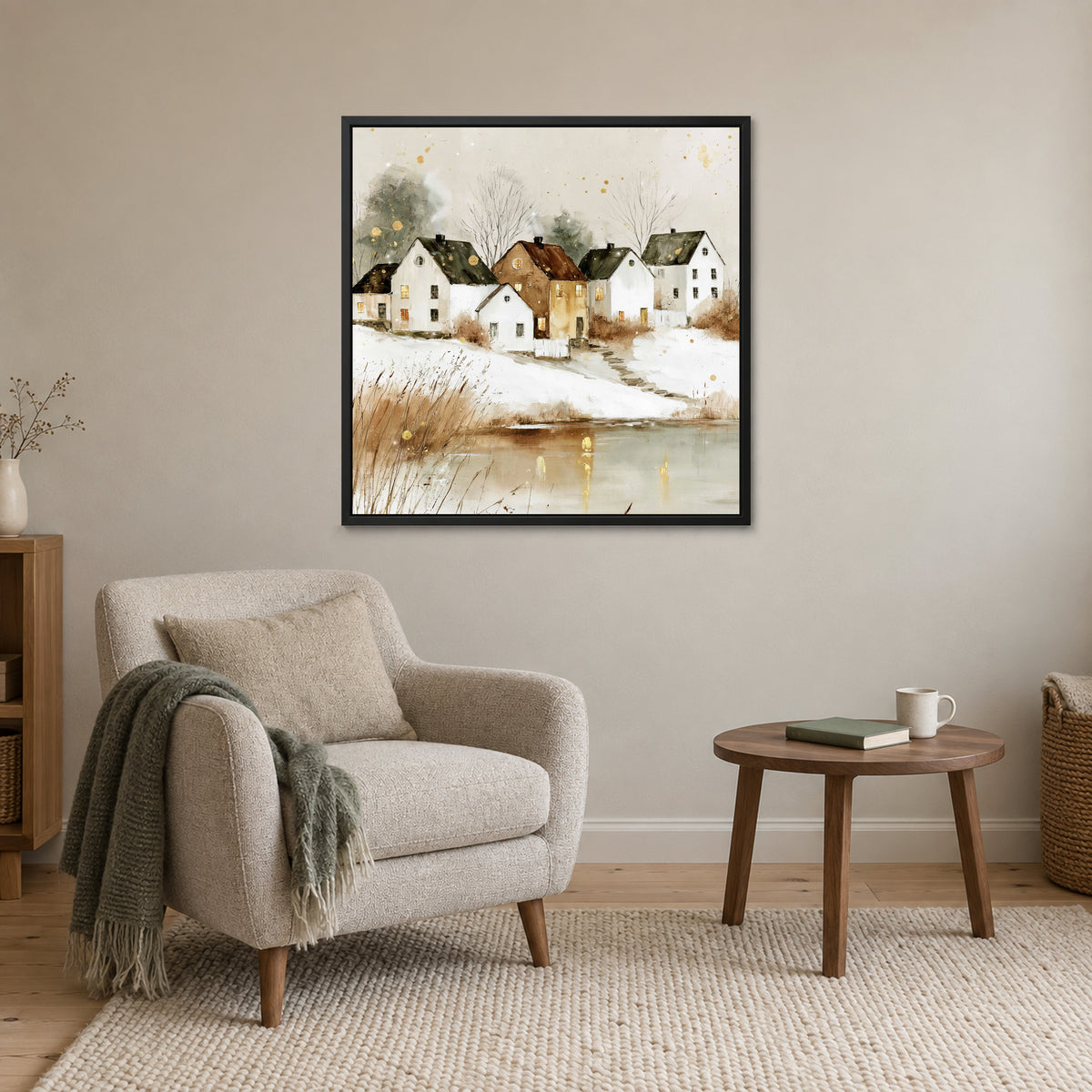 Farmhouse Row Above the Pond framed canvas in a black floating frame above a cream armchair and round wooden side table