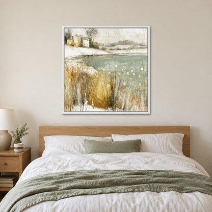Winter Grasses and a Distant Farmhouse framed canvas in a white floating frame above a bed with white linens and a sage throw