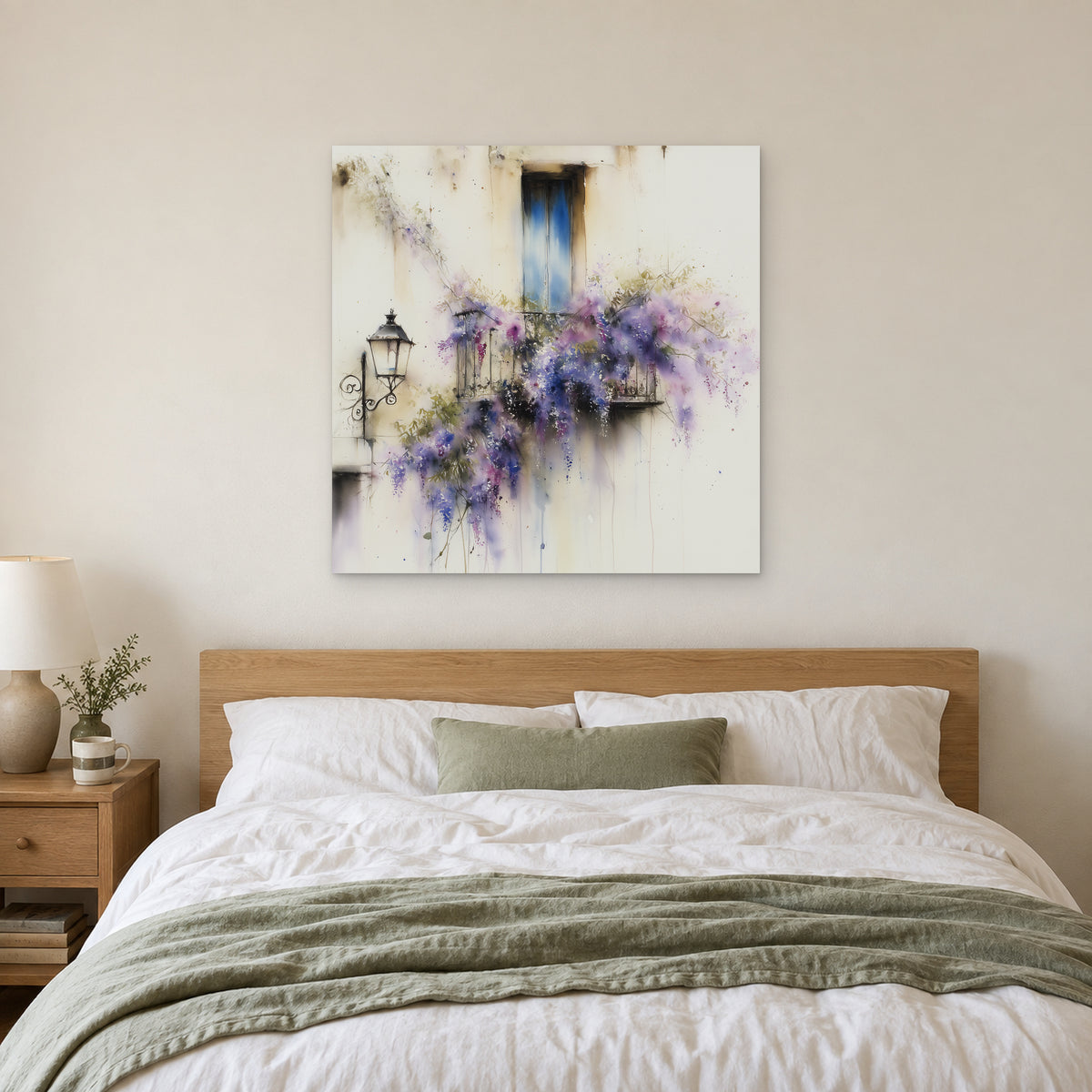 Wisteria in Full Bloom canvas wall art above a bed with white linens and a sage throw